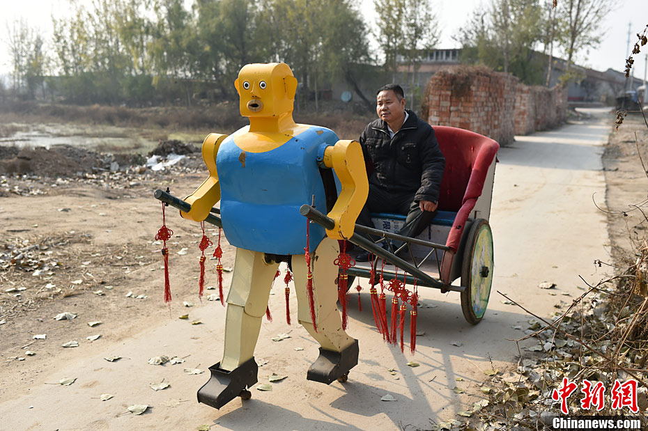 北京农民30多年造63个机器人 个个有“绝活”