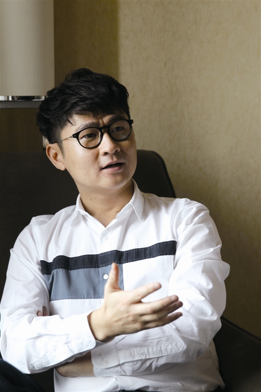 以传播中国文化为己任 巴黎19区副区长是个温