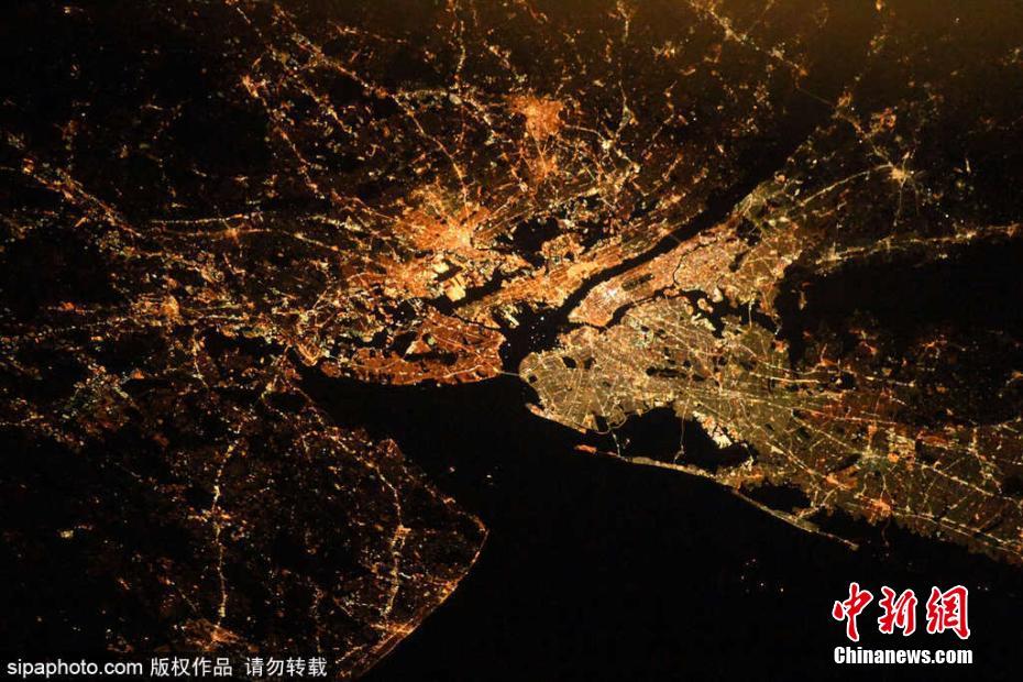 国际空间站视角下的地球城市 灯火点点如璀璨星空
