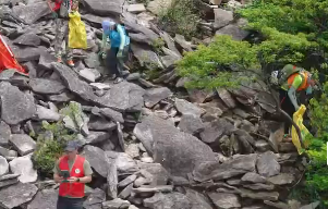 Ϊӭ����������գ�200��־Ը��ͽ��Ϊ�㵴ɽ����������